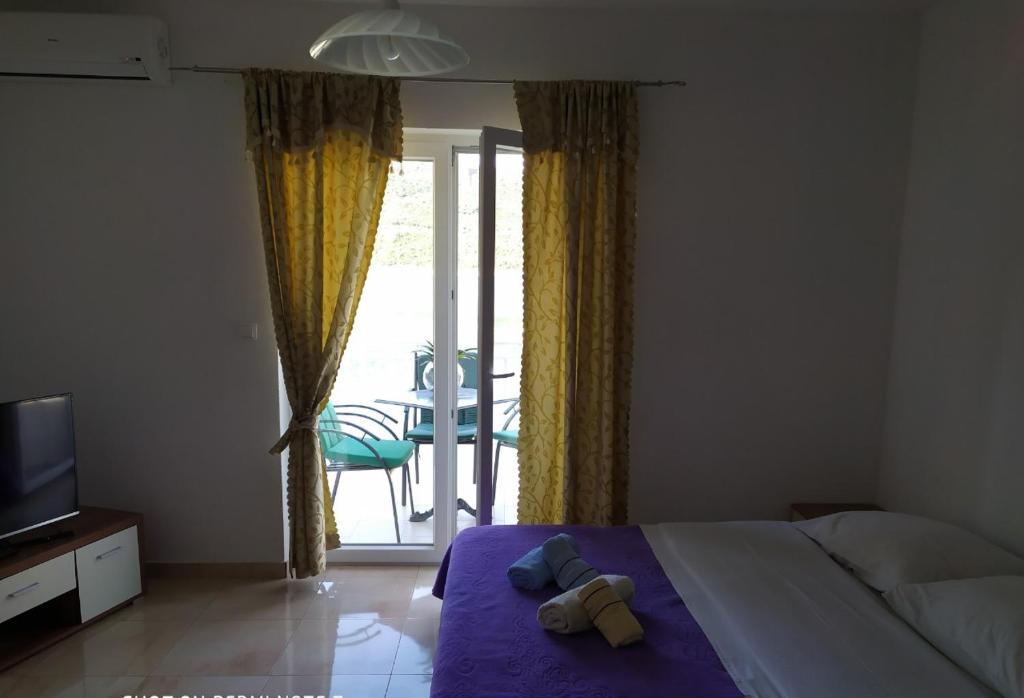 Apartmani Jopi room 1