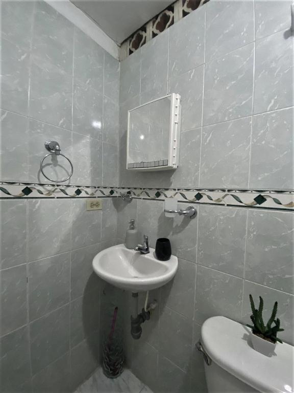 Mercanti Apts Caney room 6