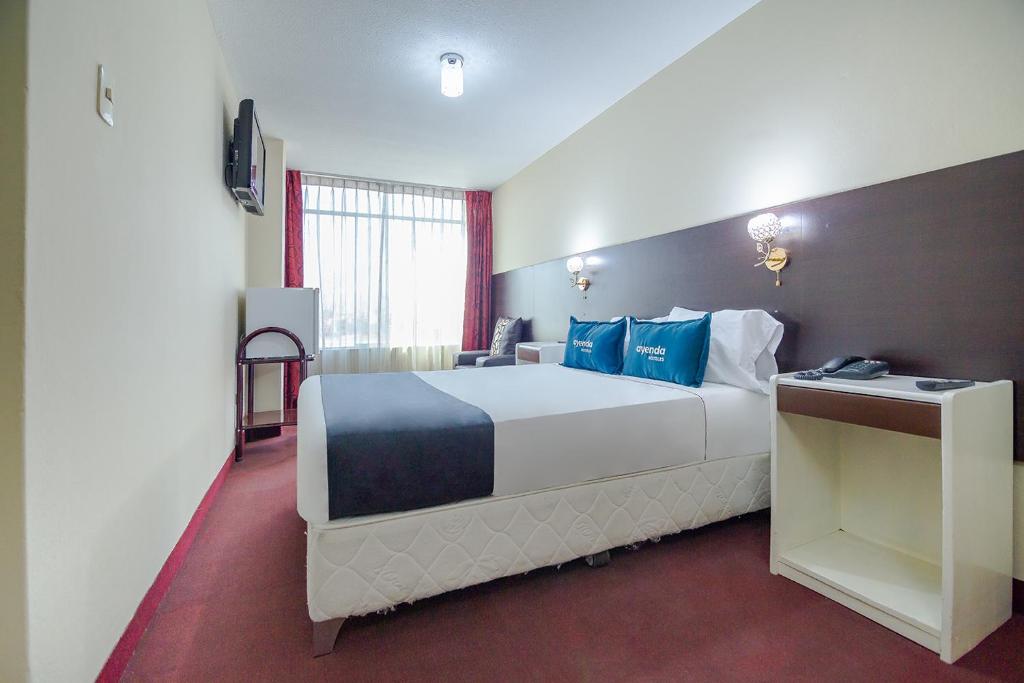 Ayenda VIP Umacollo room 5