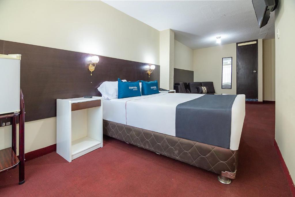 Ayenda VIP Umacollo room 6